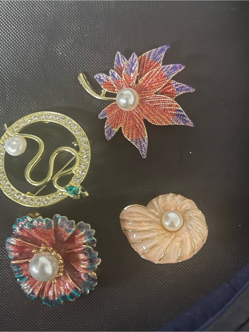Different design of  Brooch $10 each with fresh water pearl